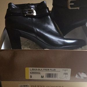 Ankle boots. Worn once with original box. Like new condition. No signs of wear.